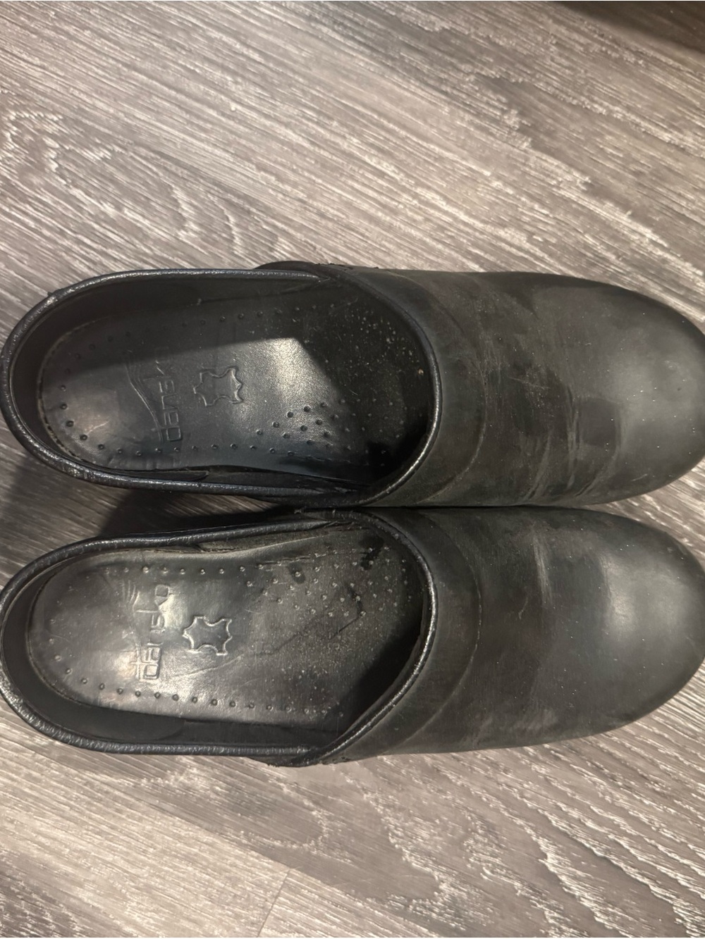 Dansko Black Leather Slip-On Women's Clogs